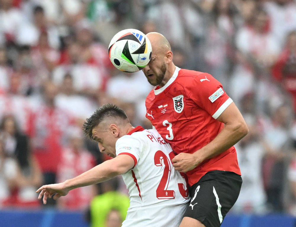 奥地利队在紧要时刻取胜,锁定欧锦赛资格 奥地利队在紧要时刻取胜,锁定欧锦赛资格